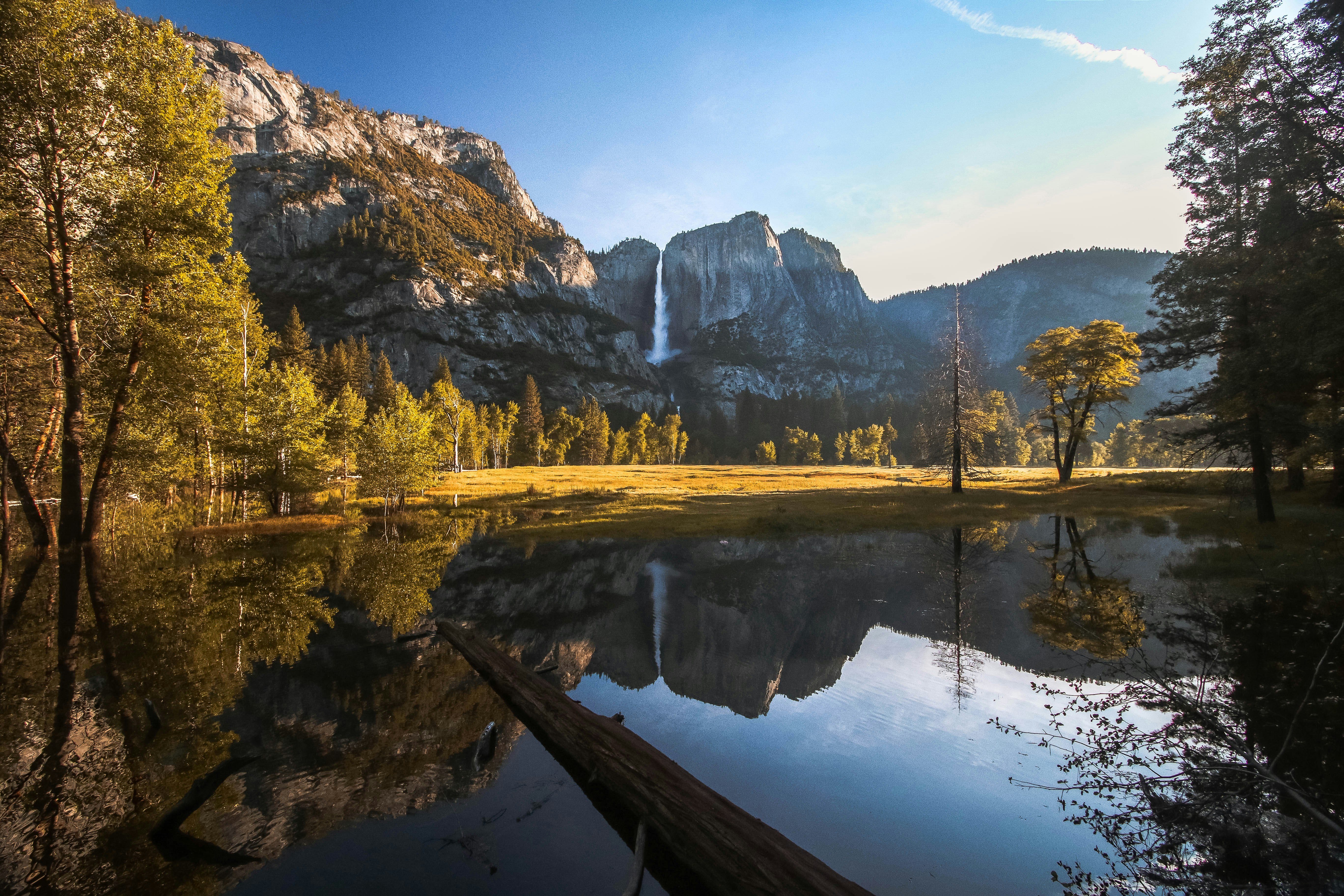 body of water near mountain range